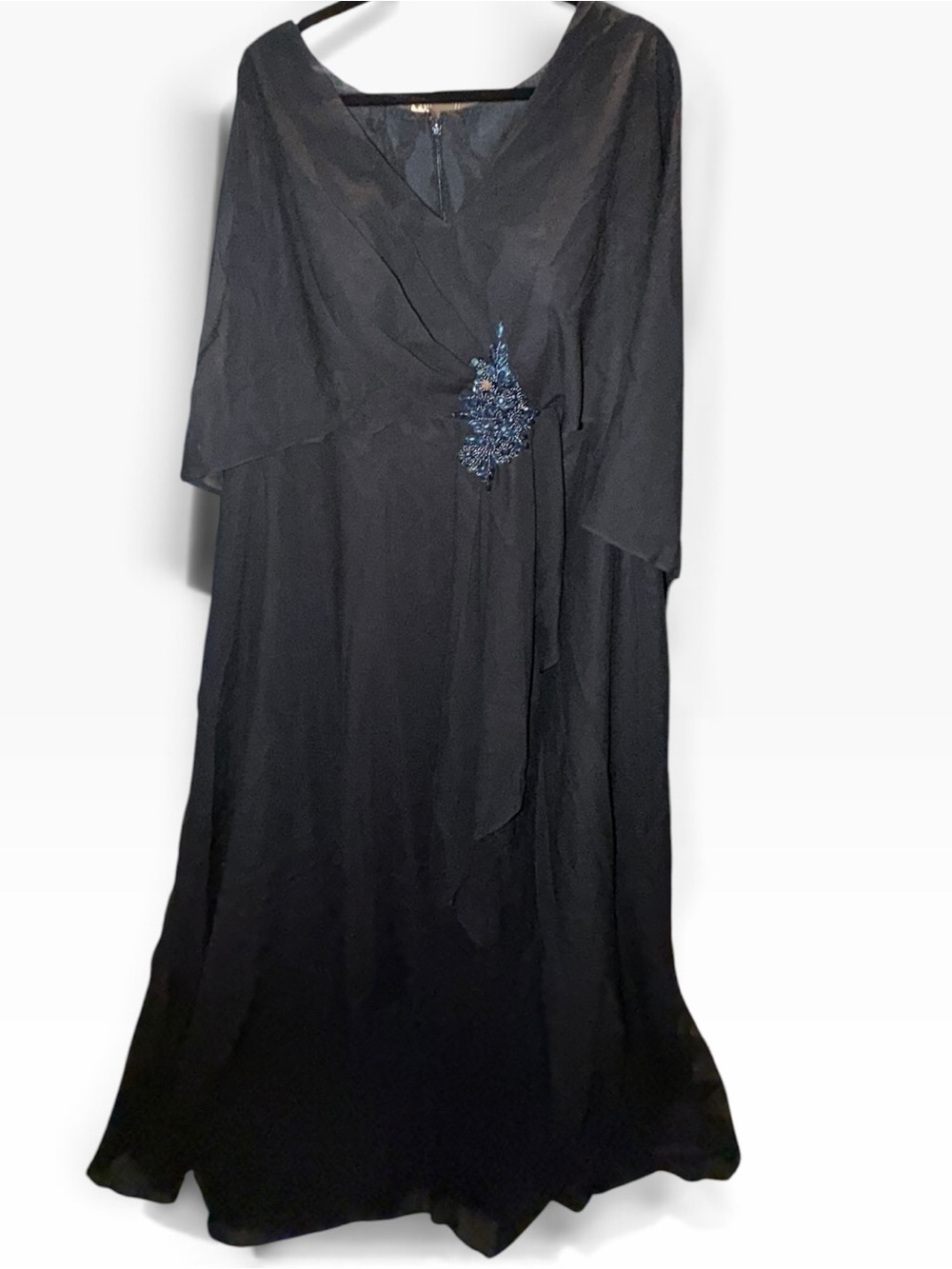 Mother of the Bride dress. Black sleeveless with sheer sleeve overlay.